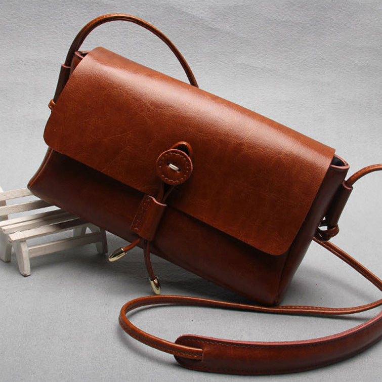 Leather bag bag buttons Korea new fashion shoulder bag ladies bags wholesale cross retro trend