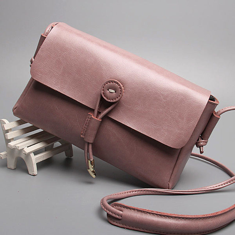 Leather bag bag buttons Korea new fashion shoulder bag ladies bags wholesale cross retro trend